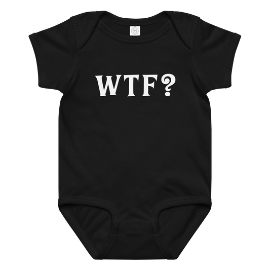 "WTF? (What the f#ck?)" printed on a black baby jersey bodysuit laying on a flat surface amongst other clothes