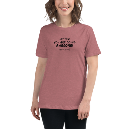"Hey You! You are doing awesome! (Yes, you)" printed on a heather mauve women's relaxed t-shirt worn by a female