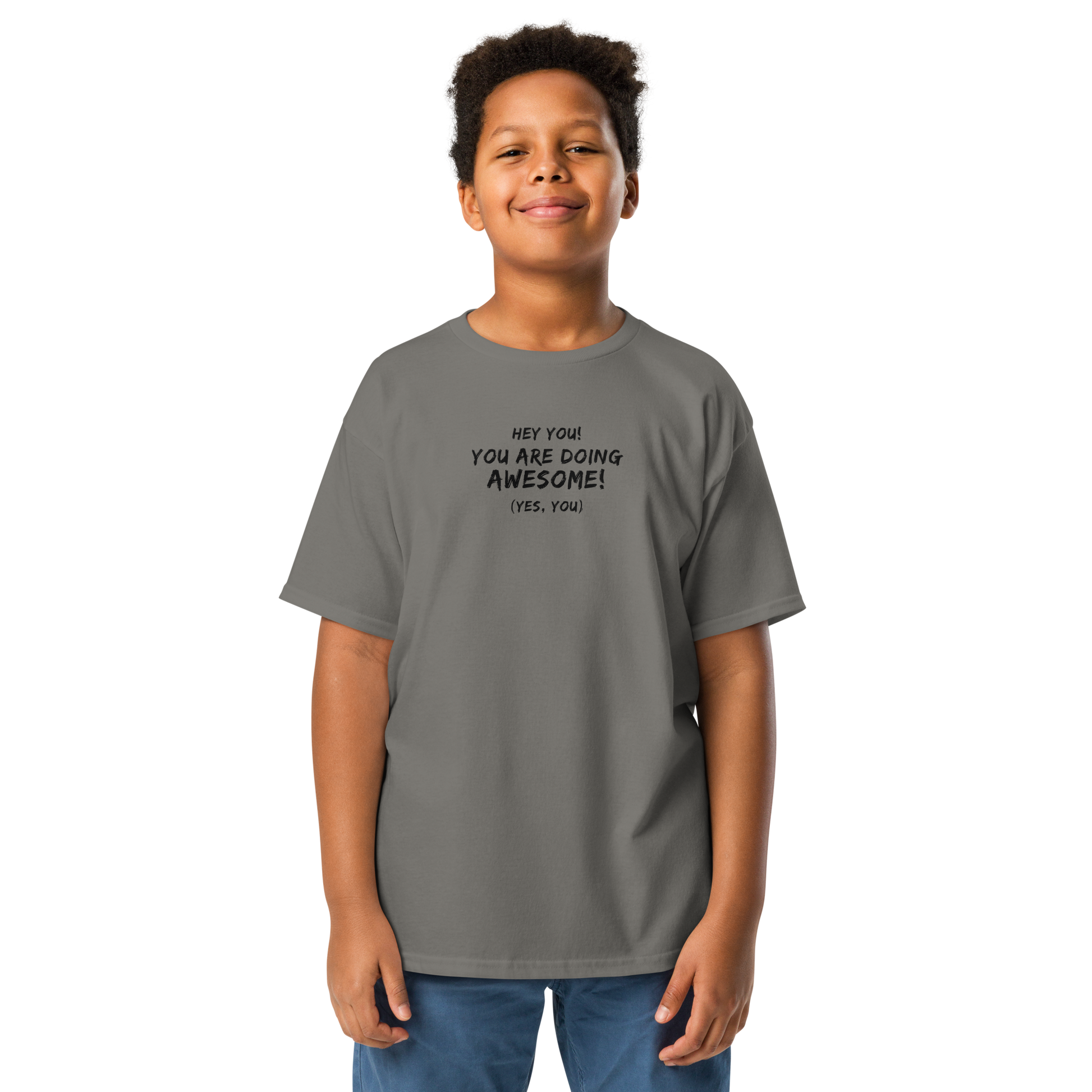 "Hey You! You are doing awesome! (Yes, you)" printed on a charcoal youth classic tee worn by a male