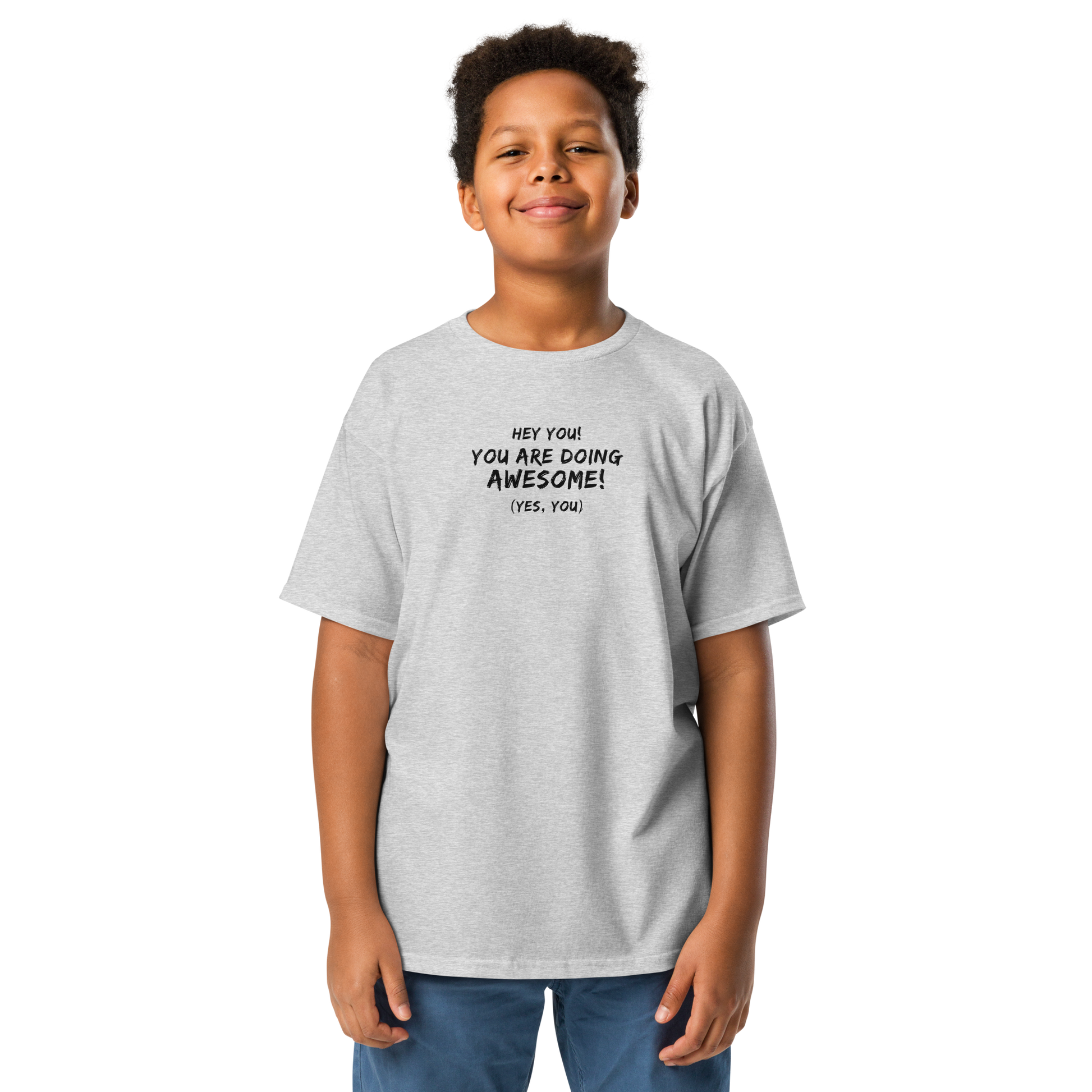 "Hey You! You are doing awesome! (Yes, you)" printed on a sport grey youth classic tee worn by a male