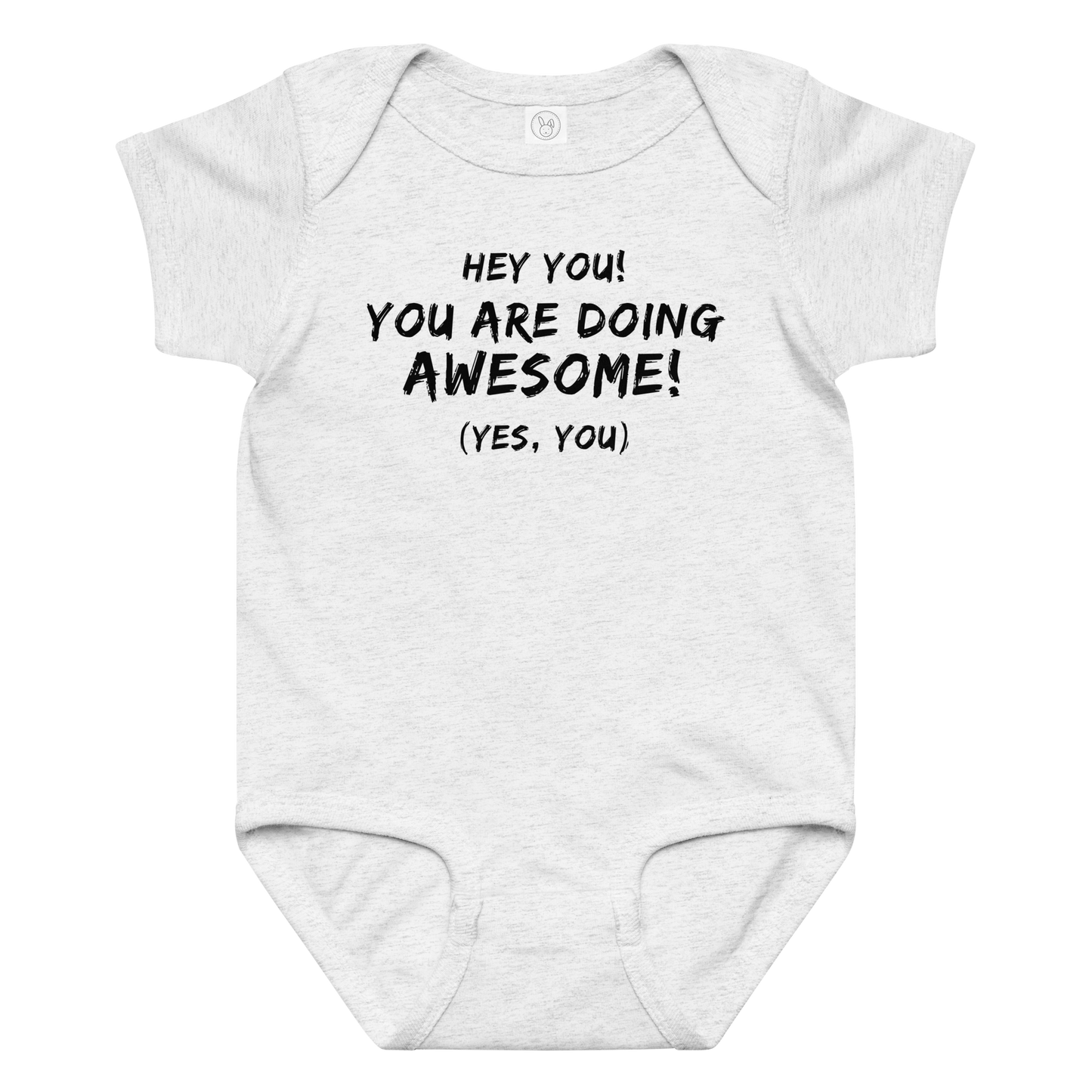 "Hey You! You are doing awesome! (Yes, you)" printed on a ash baby jersey bodysuit laying on a flat surface amongst other clothes