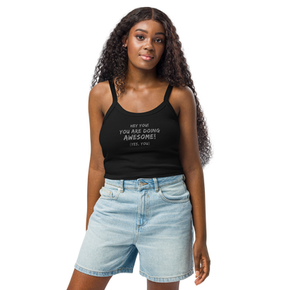 "Hey You! You are doing awesome! (Yes, you)" printed on a solid black blend women's micro-rib tanktop worn by a female