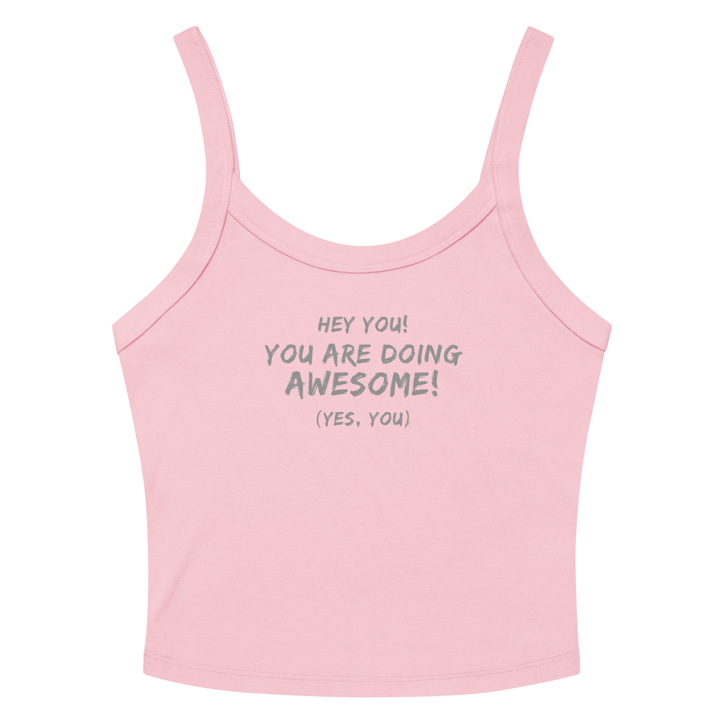 "Hey You! You are doing awesome! (Yes, you)" printed on a solid pink blend women's micro-rib tanktop laying on a flat surface amongst sunglasses and shorts