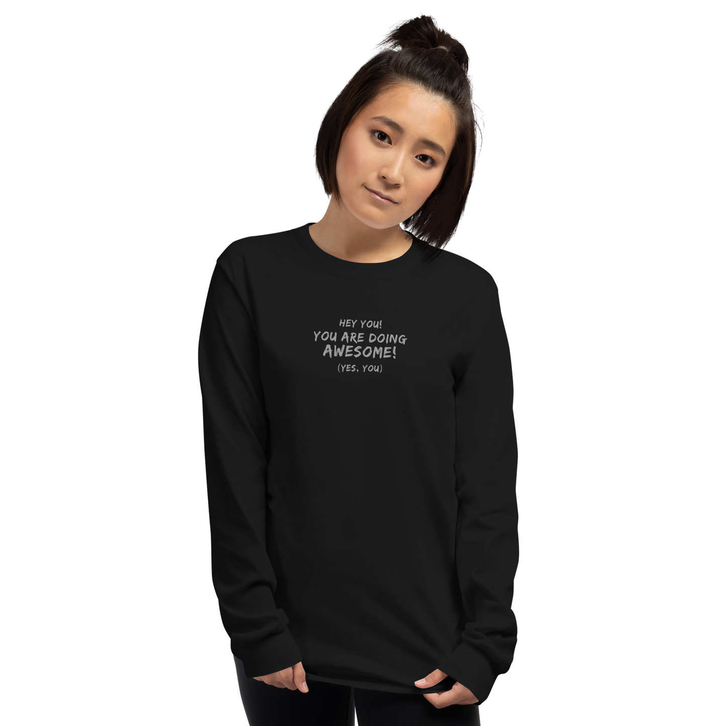 "Hey You! You are doing awesome! (Yes, you)" printed on a black men's long sleeve shirt worn by a female
