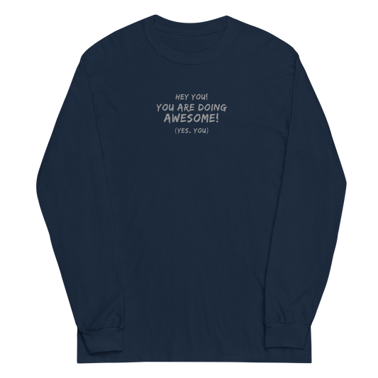 "Hey You! You are doing awesome! (Yes, you)" printed on a navy men's long sleeve shirt laying on a flat surface