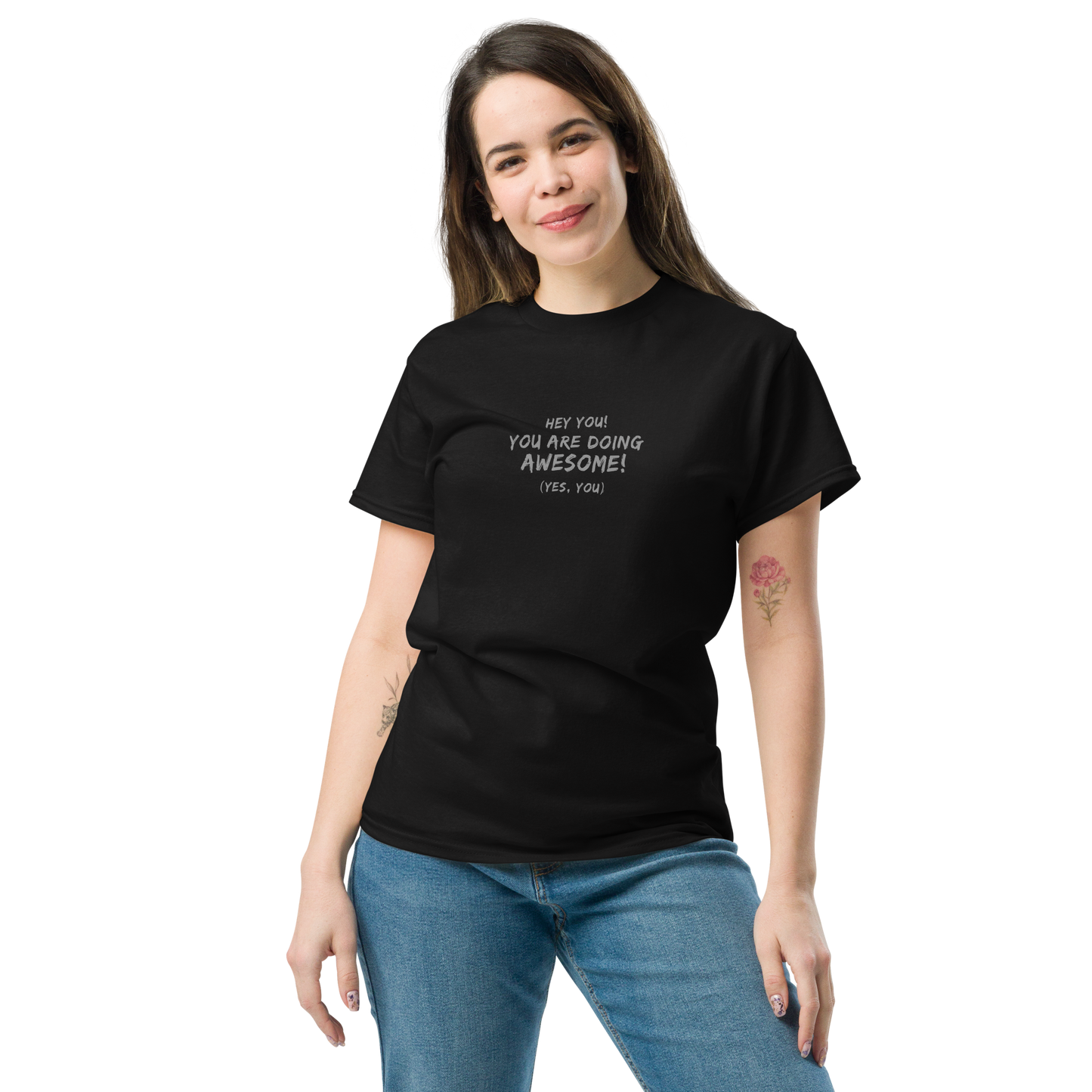 "Hey You! You are doing awesome! (Yes, you)" printed on a black unisex classic tee worn by a female