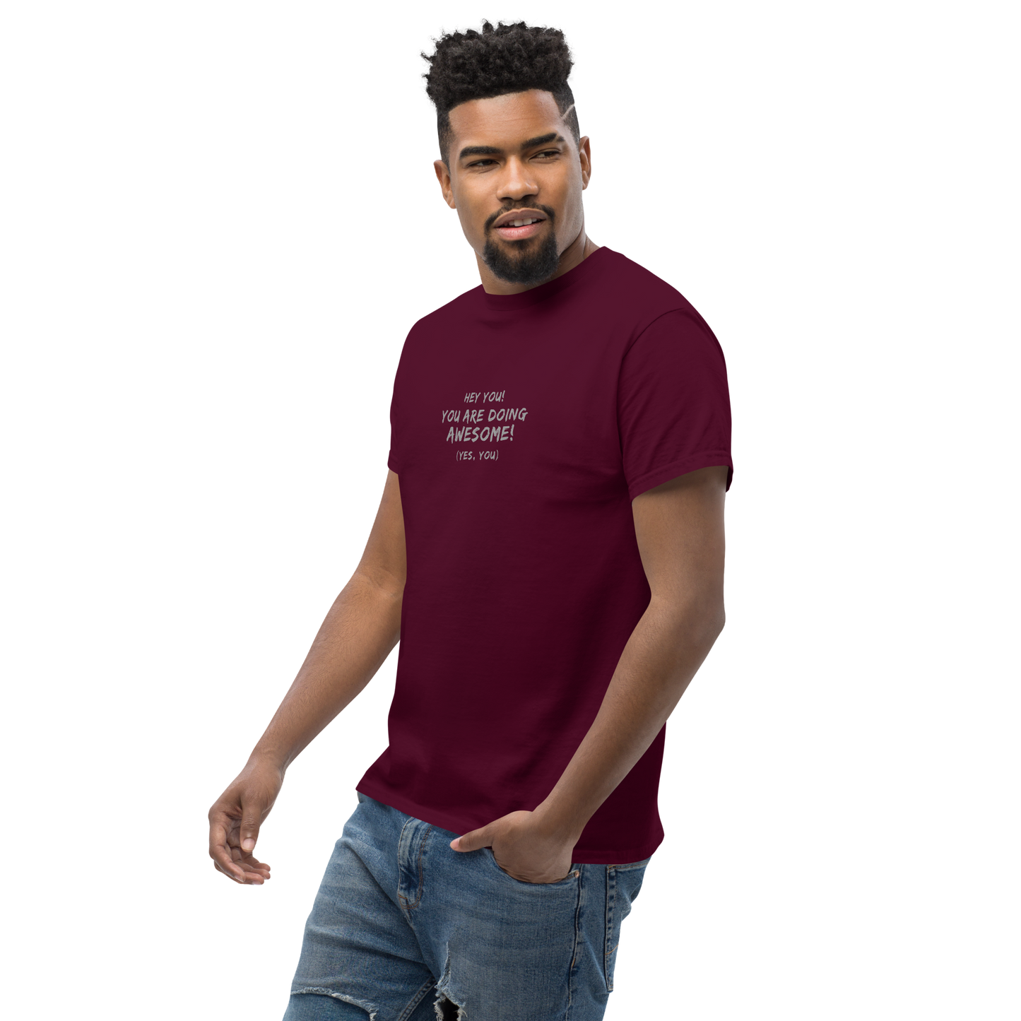 "Hey You! You are doing awesome! (Yes, you)" printed on a maroon unisex classic tee worn by a male