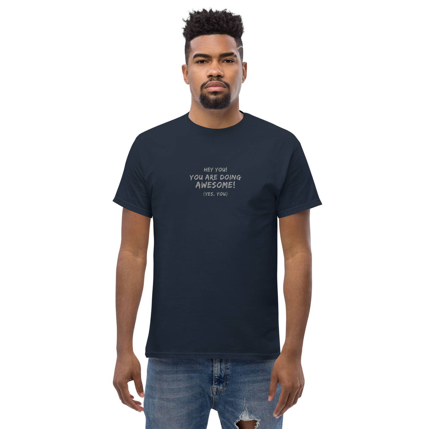 "Hey You! You are doing awesome! (Yes, you)" printed on a navy unisex classic tee worn by a male