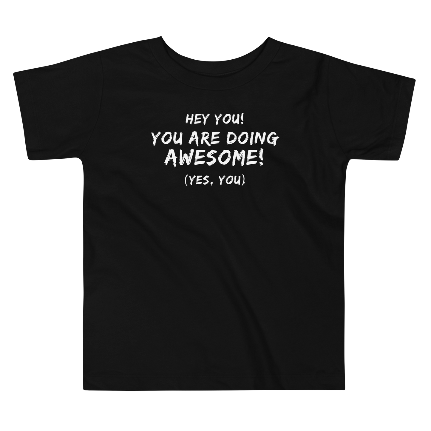 "Hey You! You are doing awesome! (Yes, you)" printed on a black toddler short sleeve tee laying on a flat surface