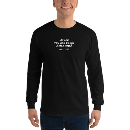 "Hey You! You are doing awesome! (Yes, you)" printed on a black men's long sleeve shirt worn by a male