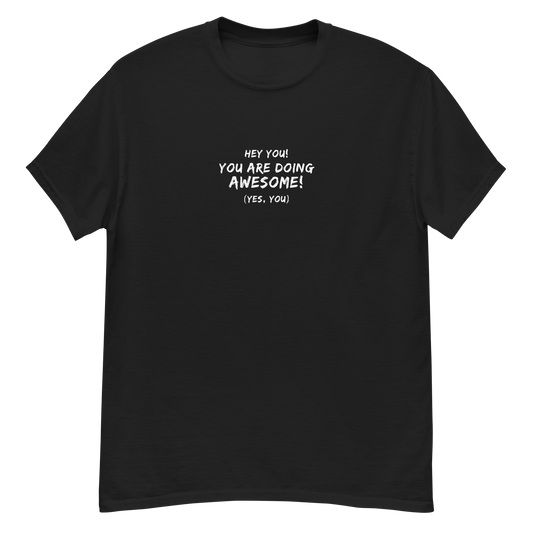 "Hey You! You are doing awesome! (Yes, you)" printed on a black unisex classic tee laying on a flat surface