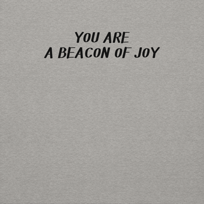 "You are a beacon of joy" printed on a carbon grey background