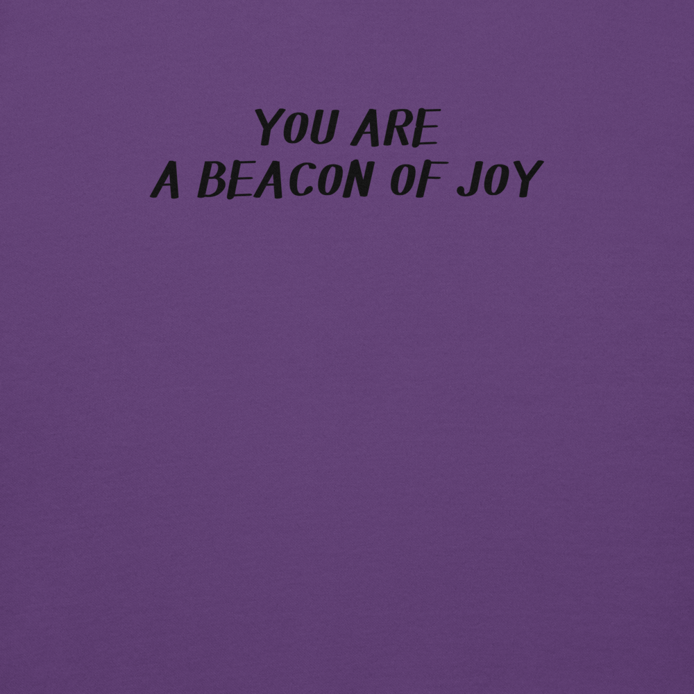 "You are a beacon of joy" printed on a purple background