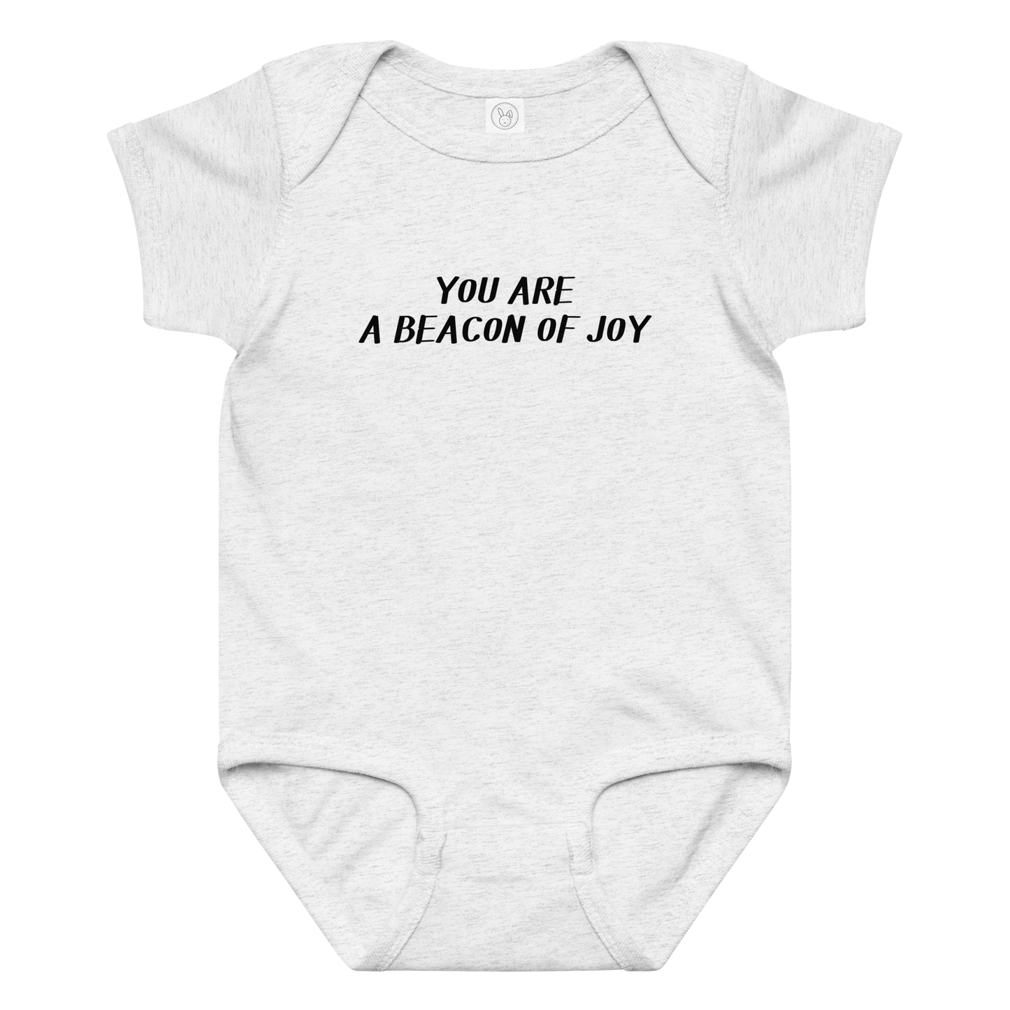 "You are a beacon of joy" printed on a ash baby jersey bodysuit laying on a flat surface amongst other clothes