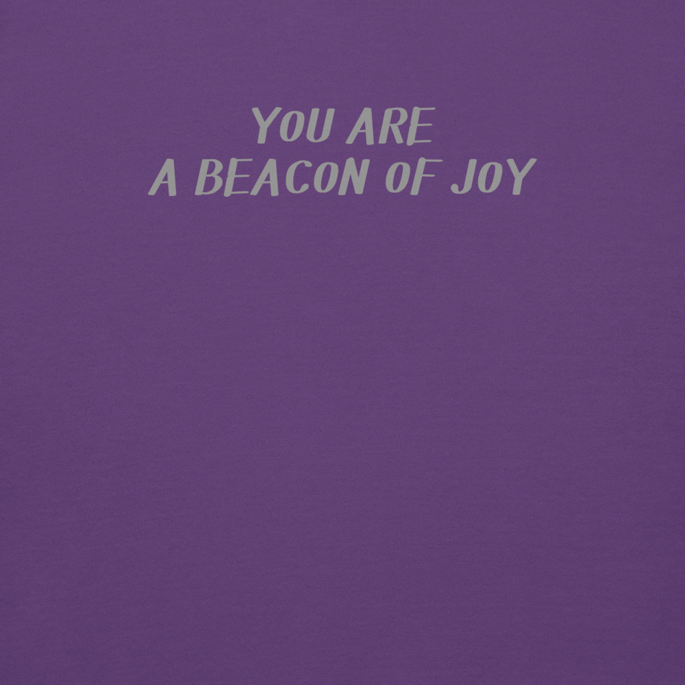 "You are a beacon of joy" printed on a purple background