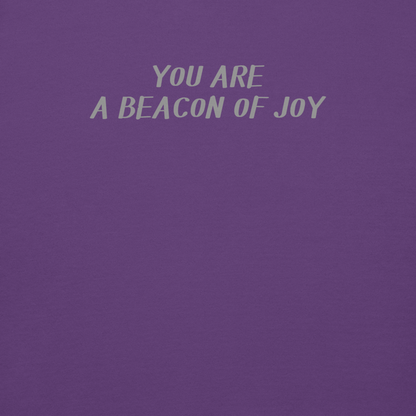 "You are a beacon of joy" printed on a purple background
