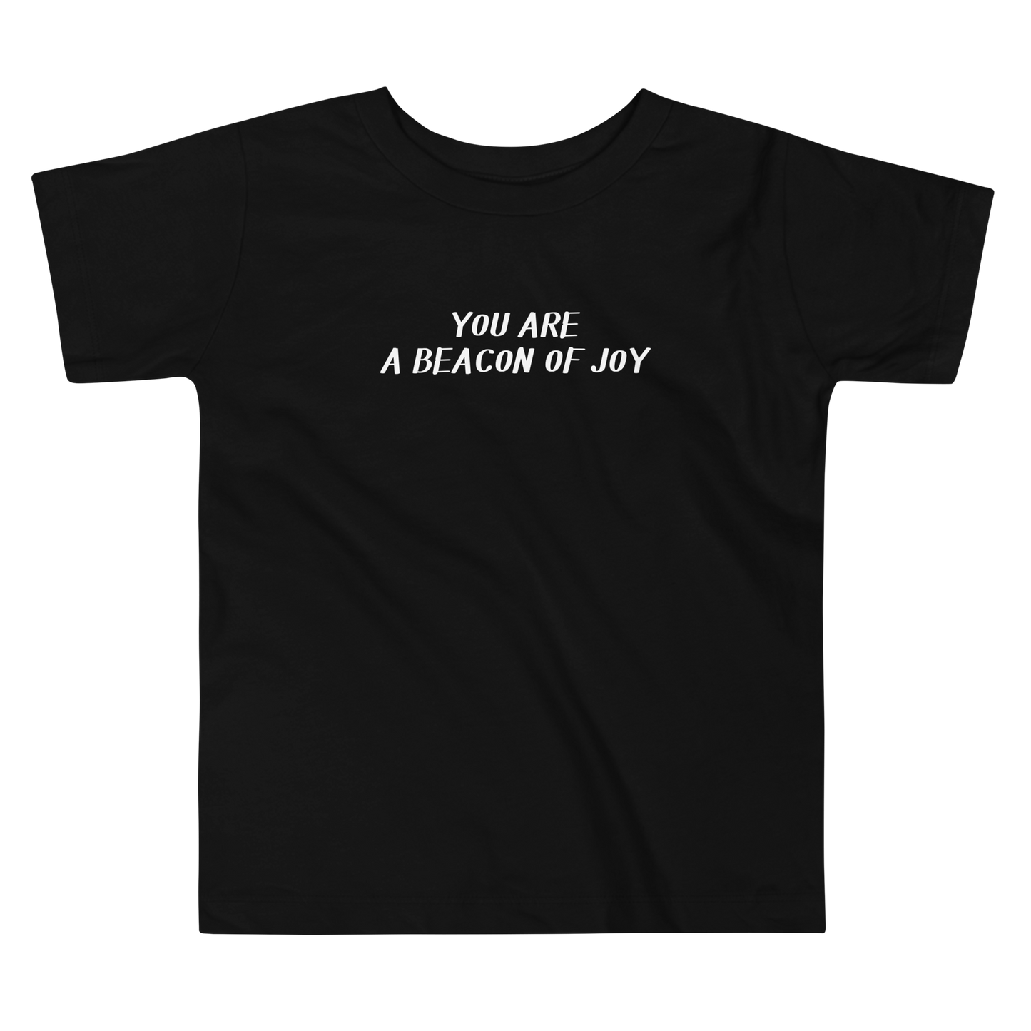 "You are a beacon of joy" printed on a black toddler short sleeve tee laying on a flat surface