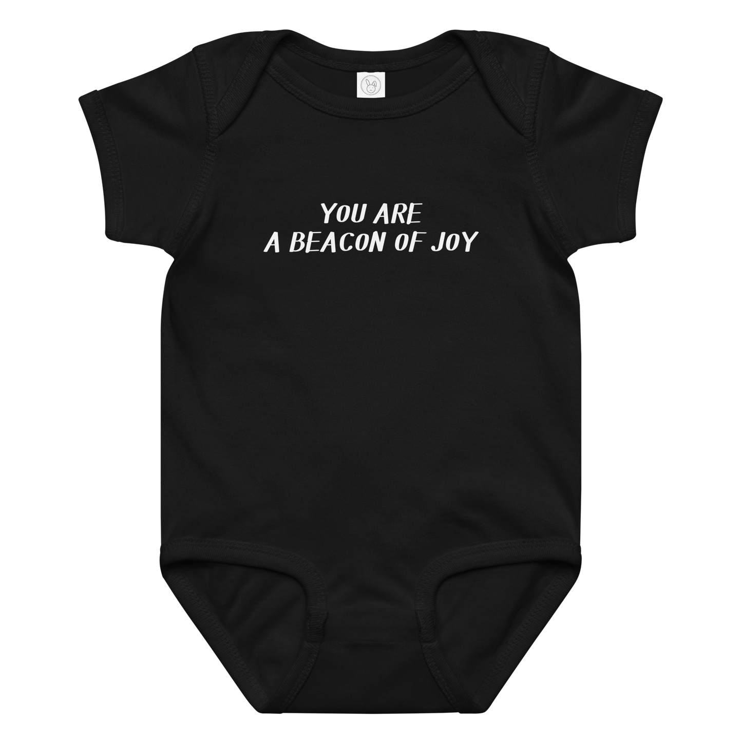 "You are a beacon of joy" printed on a black baby jersey bodysuit laying on a flat surface amongst other clothes