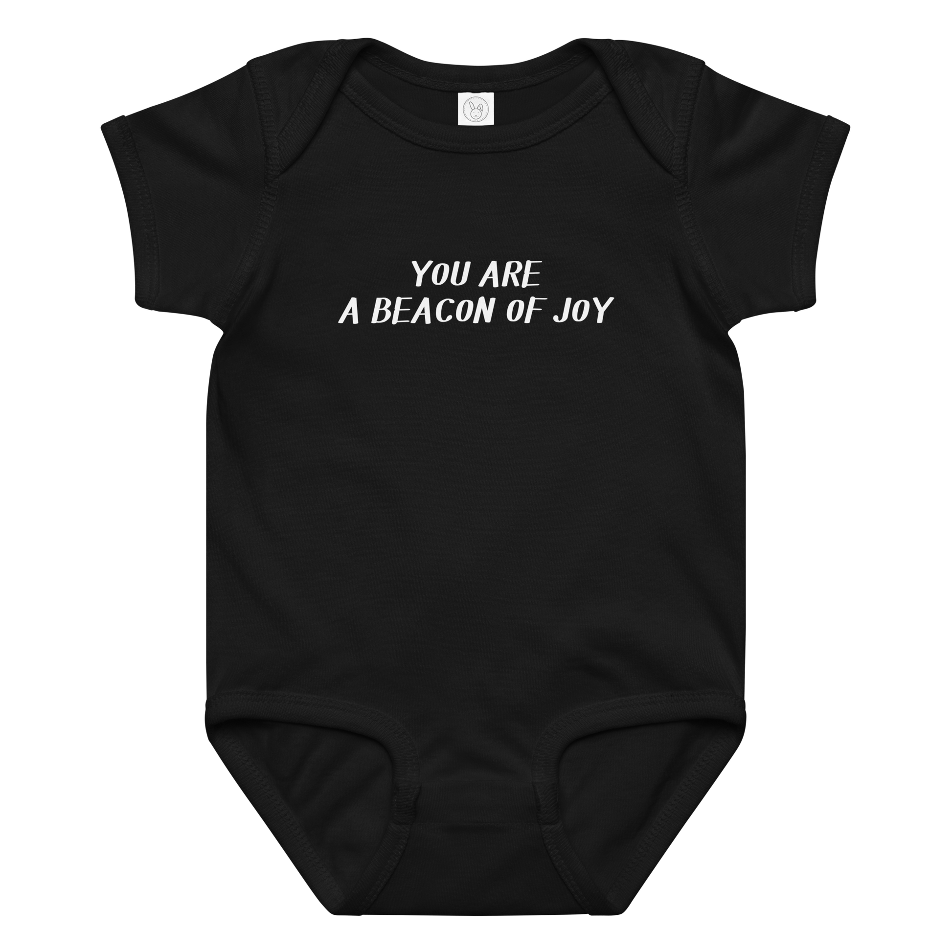 "You are a beacon of joy" printed on a black baby jersey bodysuit laying on a flat surface amongst other clothes