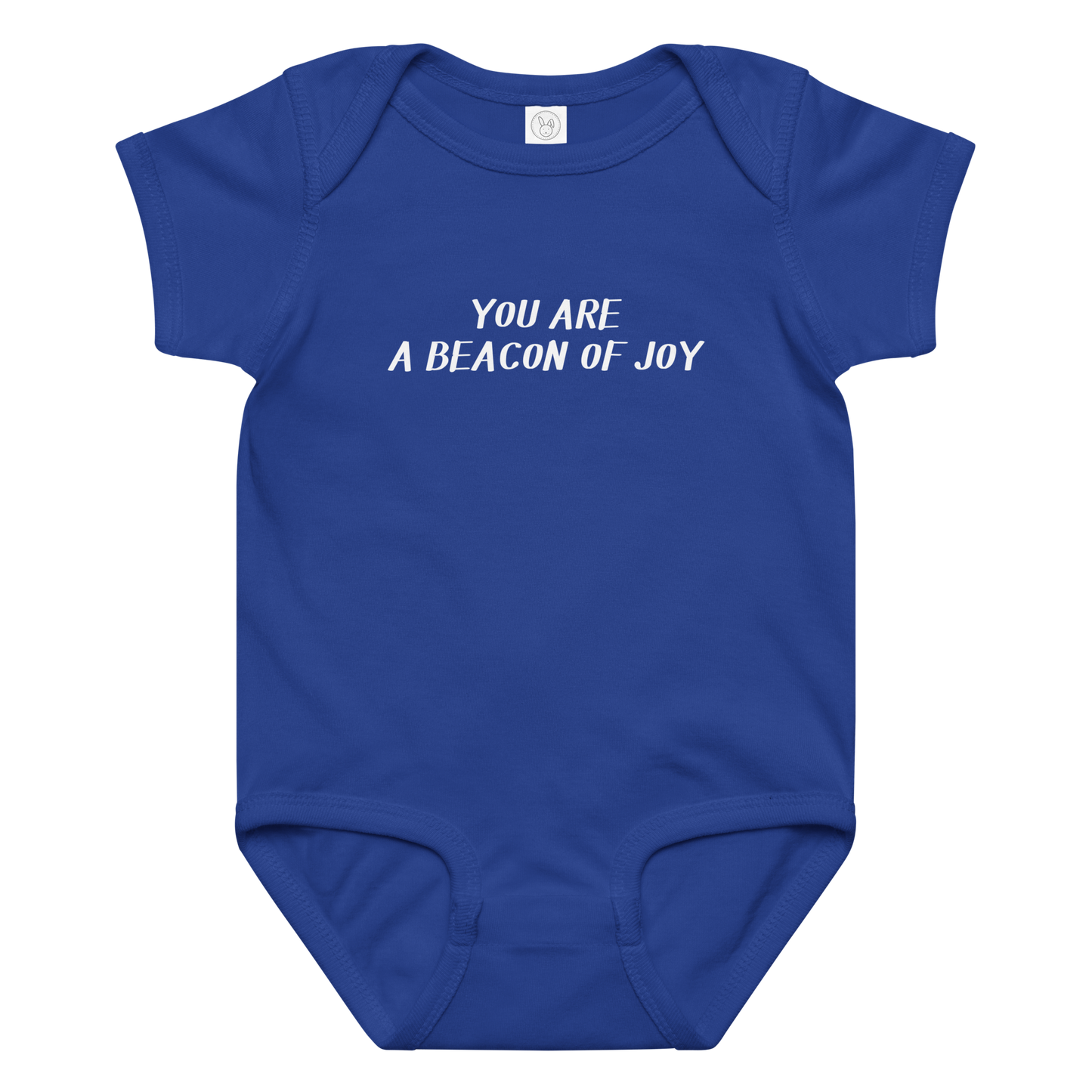 "You are a beacon of joy" printed on a royal baby jersey bodysuit laying on a flat surface amongst other clothes