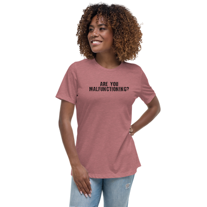 "Are you malfunctioning?" printed on a heather mauve women's relaxed t-shirt worn by a female