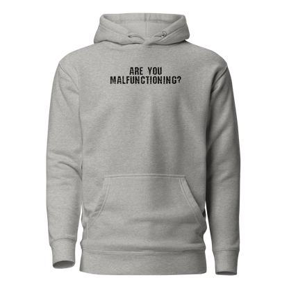 "Are you malfunctioning?" printed on a carbon grey on an invisible / simulated body