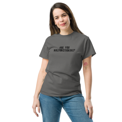 "Are you malfunctioning?" printed on a charcoal unisex classic tee worn by a female