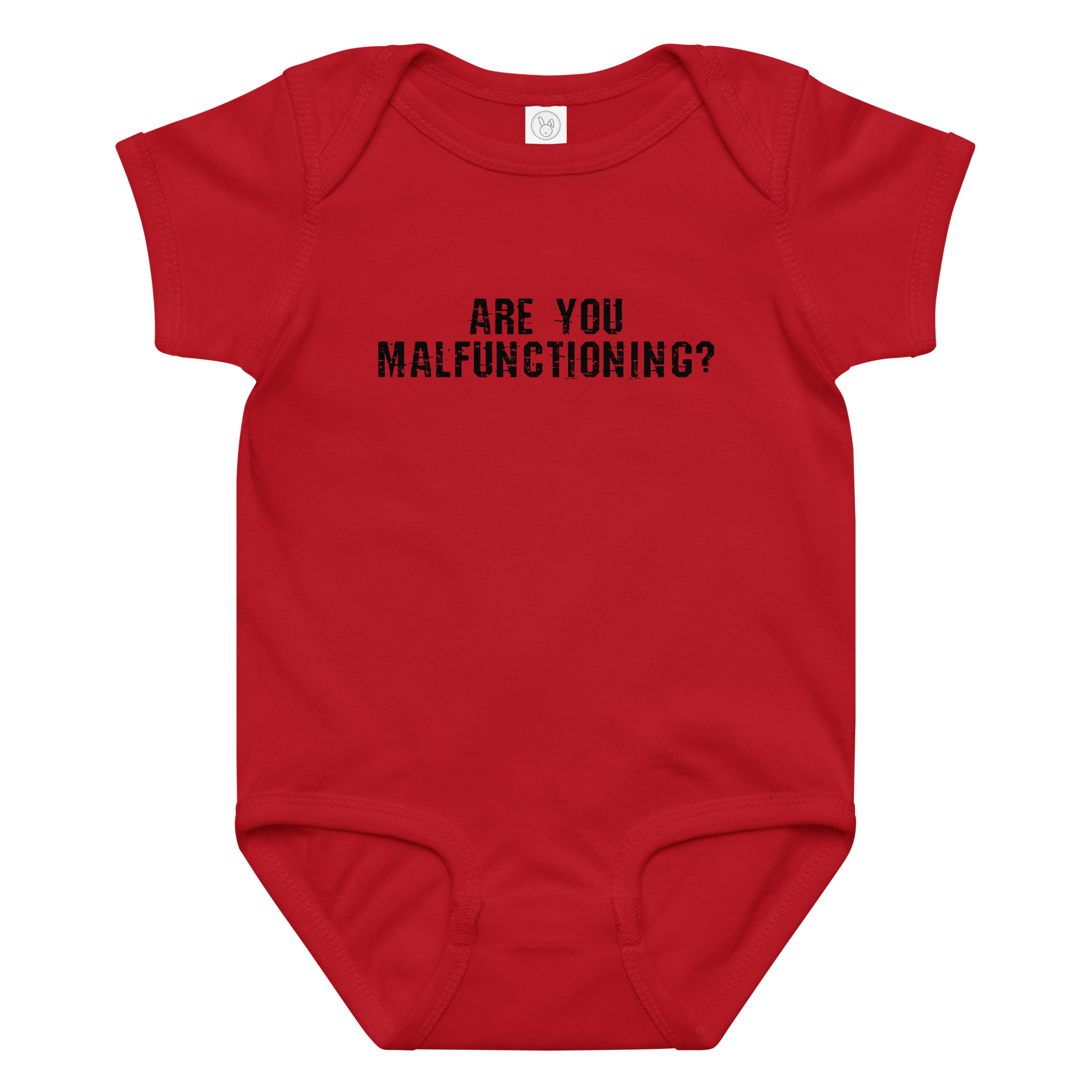 "Are you malfunctioning?" printed on a red baby jersey bodysuit laying on a flat surface amongst other clothes