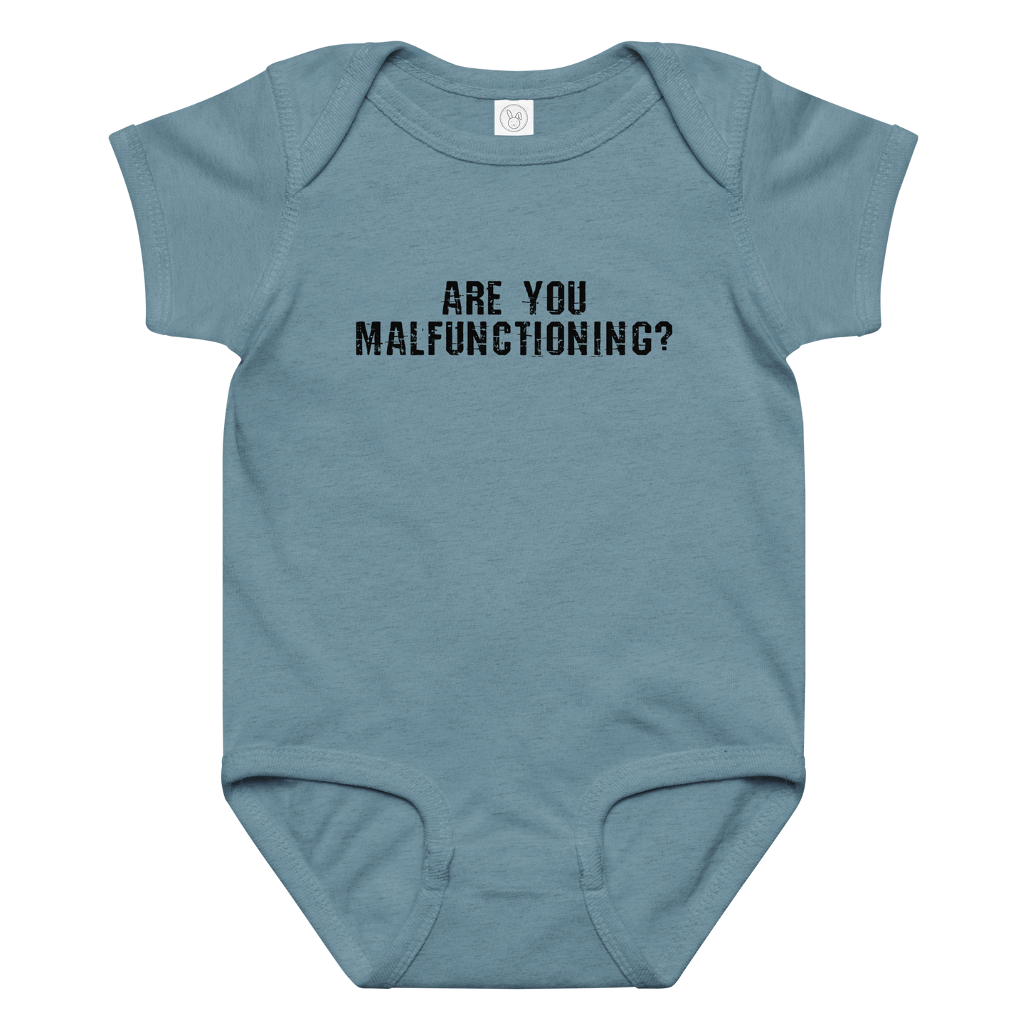 "Are you malfunctioning?" printed on a vintage indigo baby jersey bodysuit laying on a flat surface amongst other clothes