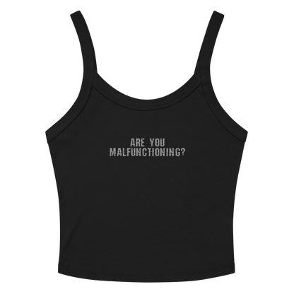 "Are you malfunctioning?" printed on a solid black blend women's micro-rib tanktop laying on a flat surface amongst sunglasses and shorts