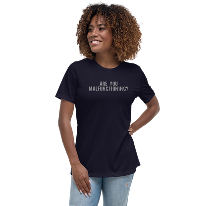 "Are you malfunctioning?" printed on a navy women's relaxed t-shirt worn by a female