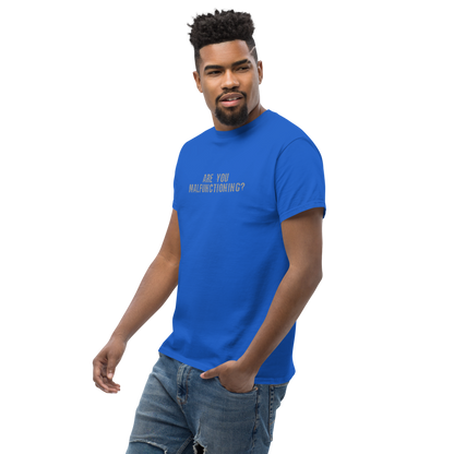 "Are you malfunctioning?" printed on a royal unisex classic tee worn by a male