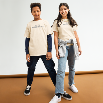 "Are you malfunctioning?" printed on a natural youth classic tee worn by a female and male