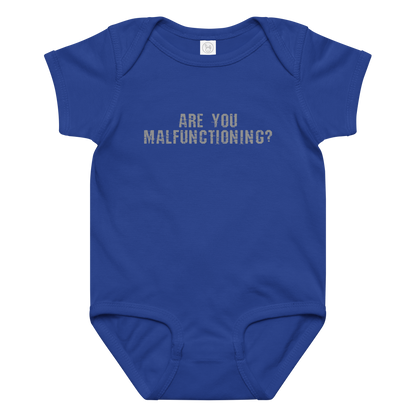 "Are you malfunctioning?" printed on a royal baby jersey bodysuit laying on a flat surface amongst other clothes