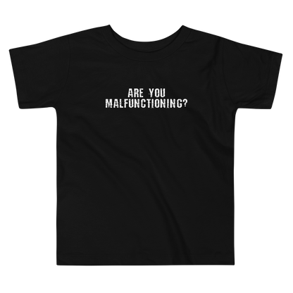 "Are you malfunctioning?" printed on a black toddler short sleeve tee laying on a flat surface