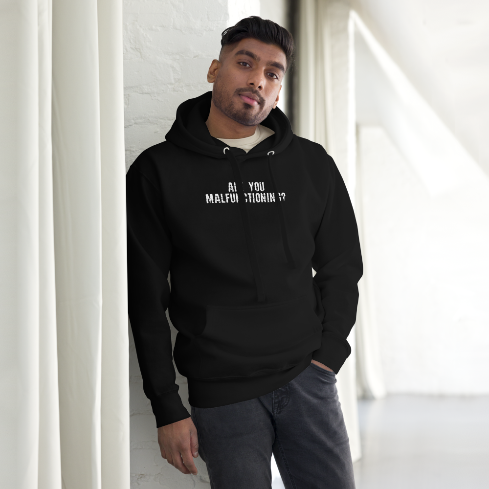 "Are you malfunctioning?" printed on a black unisex hoodie worn by a male