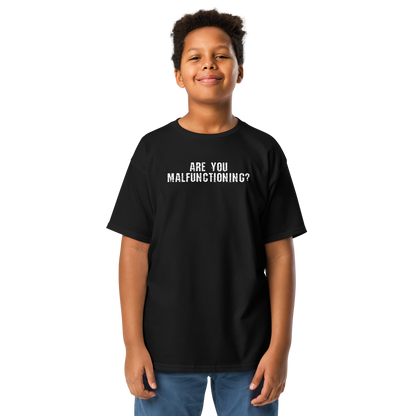 "Are you malfunctioning?" printed on a black youth classic tee worn by a male
