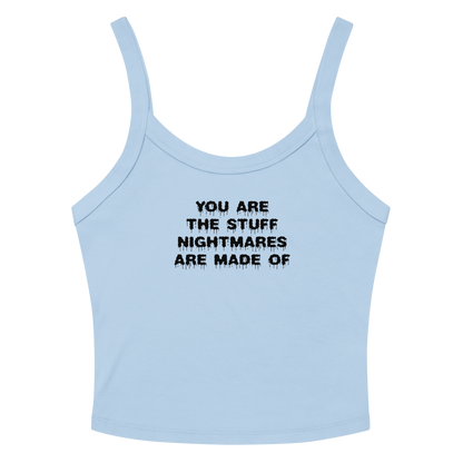 "You are the stuff nightmares are made of" printed on a solid baby blue blend women's micro-rib tanktop laying on a flat surface amongst sunglasses and shorts