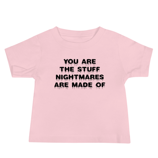"You are the stuff nightmares are made of" printed on a pink baby jersey short sleeve tee laying on a flat surface