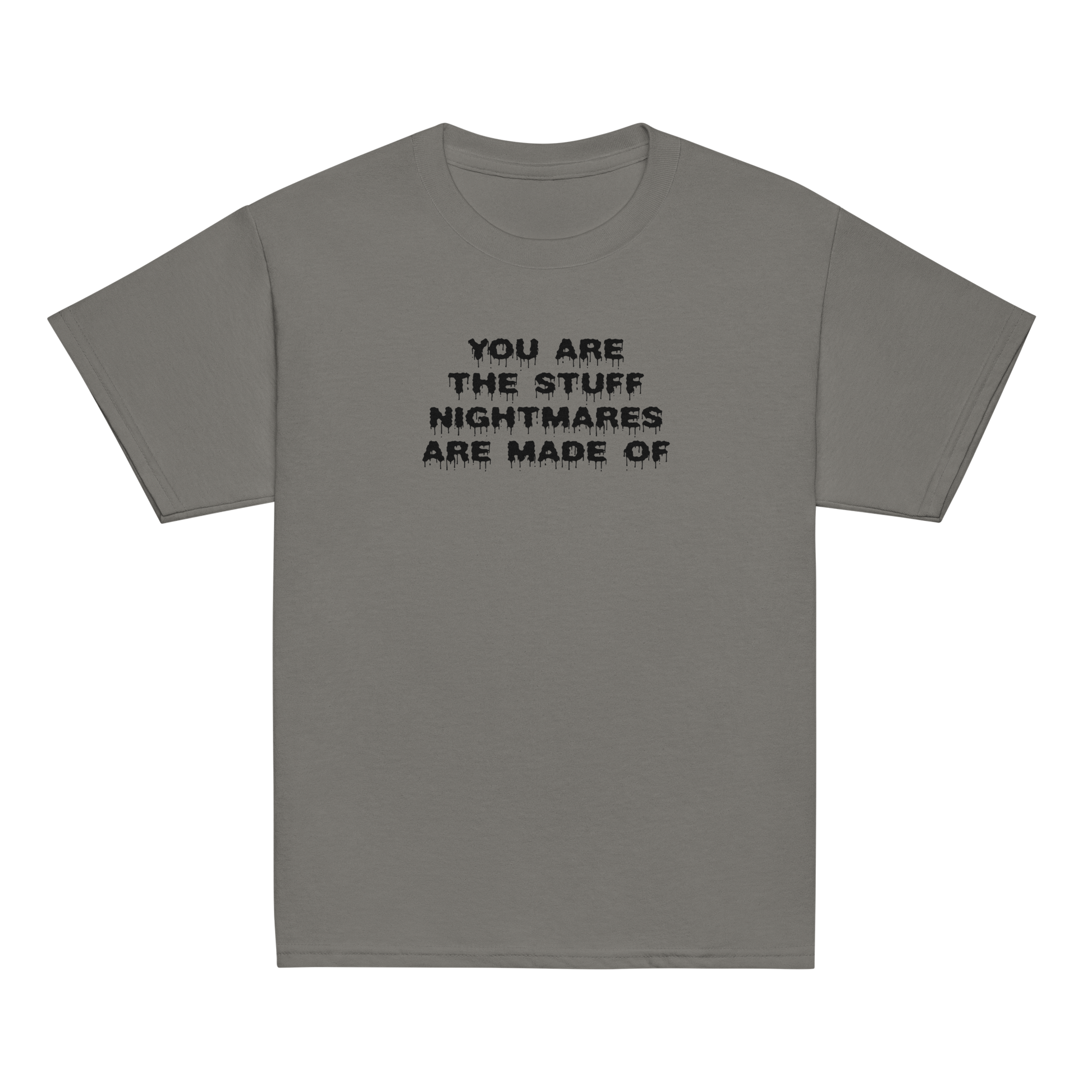 "You are the stuff nightmares are made of" printed on a charcoal youth classic tee laying on a flat surface