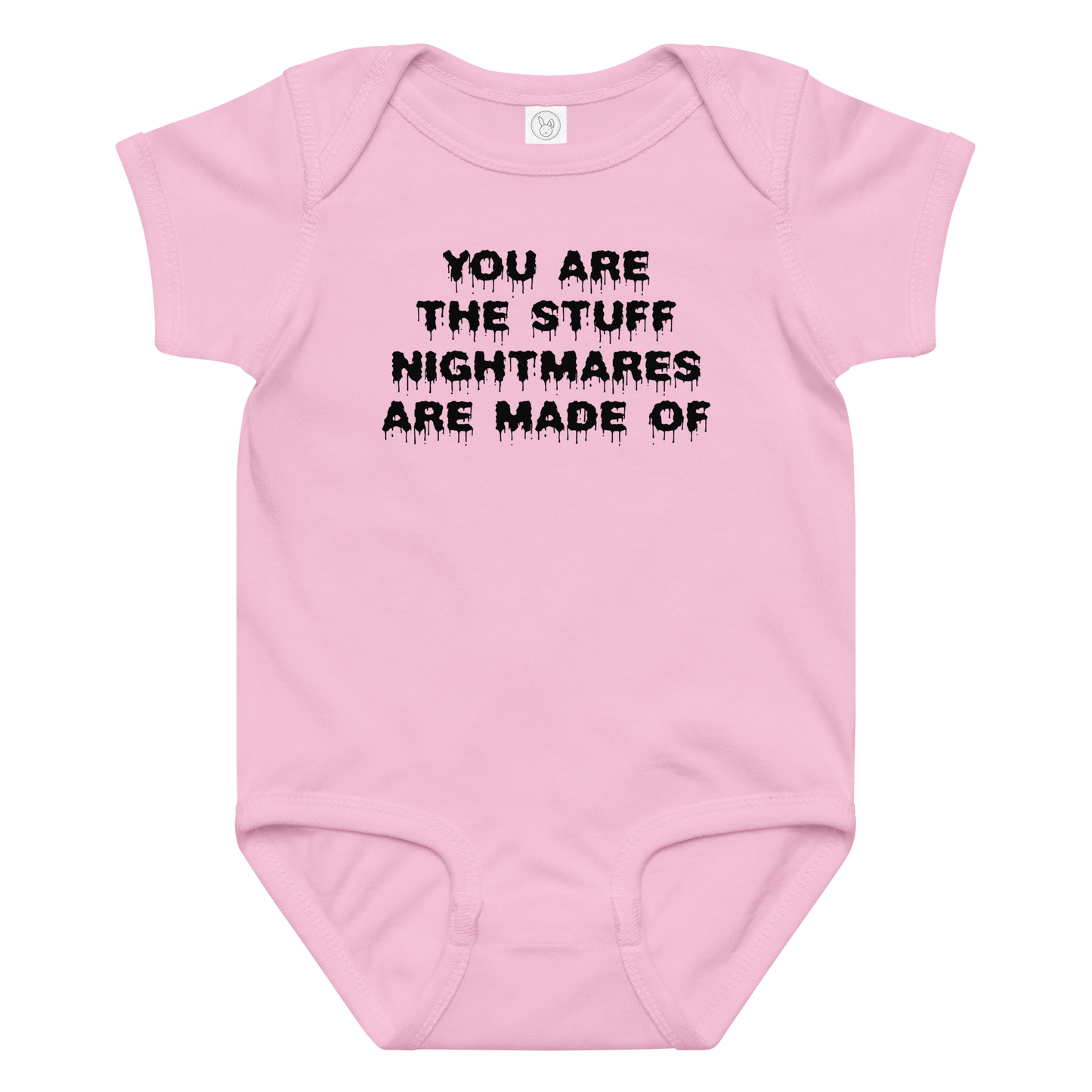 "You are the stuff nightmares are made of" printed on a pink baby jersey bodysuit laying on a flat surface amongst other clothes