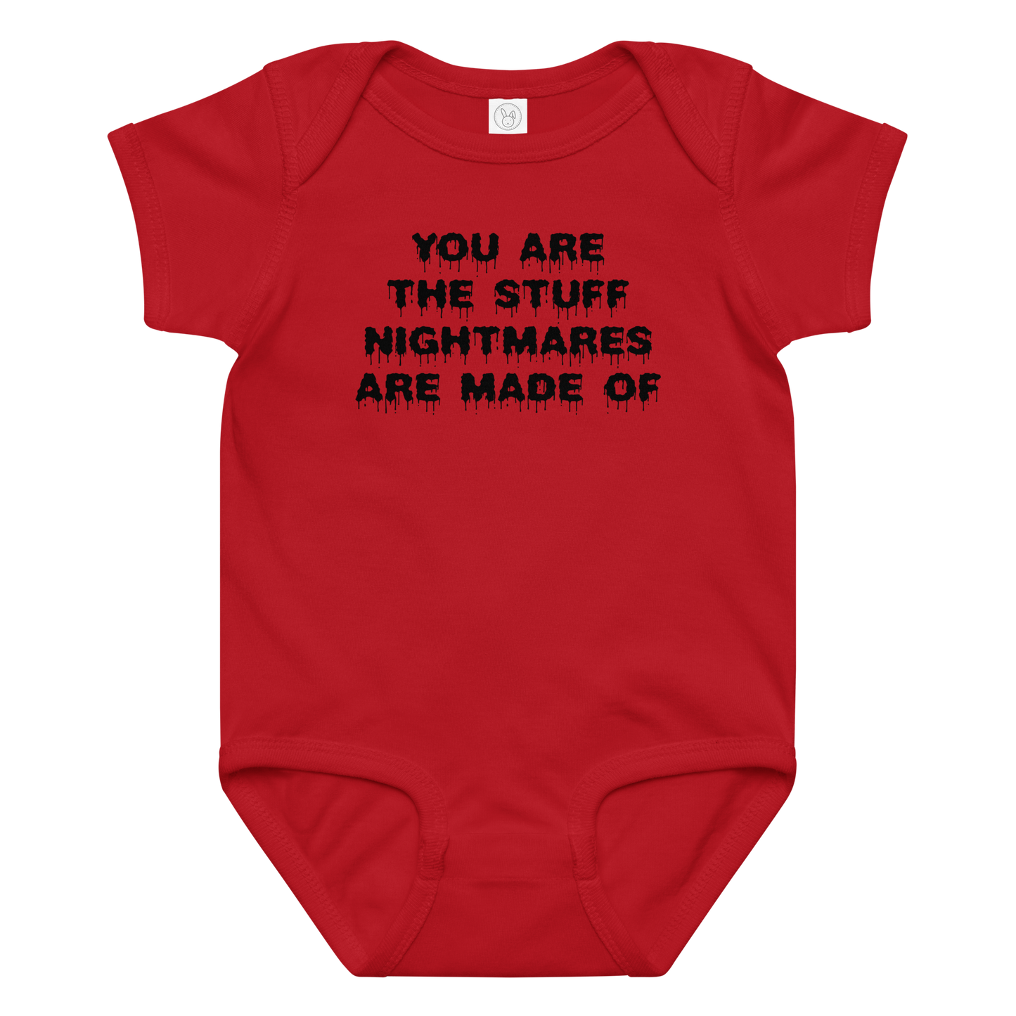 "You are the stuff nightmares are made of" printed on a red baby jersey bodysuit laying on a flat surface amongst other clothes