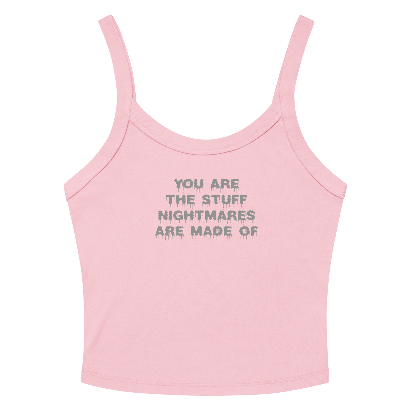 "You are the stuff nightmares are made of" printed on a solid pink blend women's micro-rib tanktop laying on a flat surface amongst sunglasses and shorts