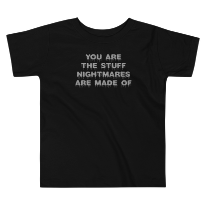 "You are the stuff nightmares are made of" printed on a black toddler short sleeve tee laying on a flat surface