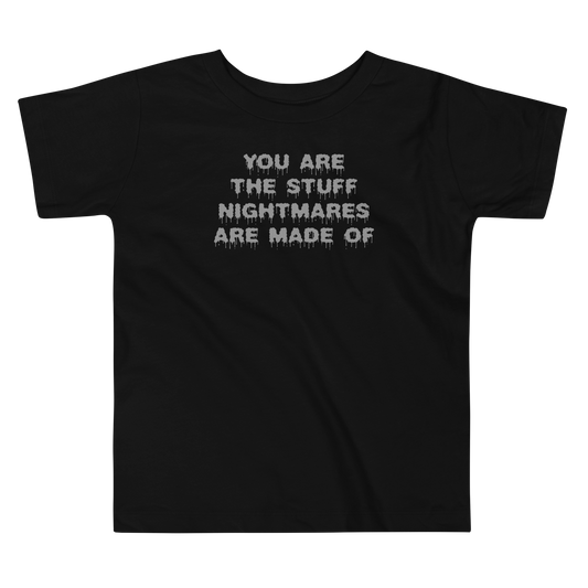 "You are the stuff nightmares are made of" printed on a black toddler short sleeve tee laying on a flat surface