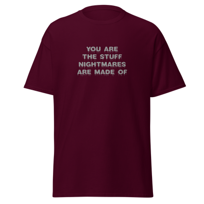 "You are the stuff nightmares are made of" printed on a maroon on an invisible body