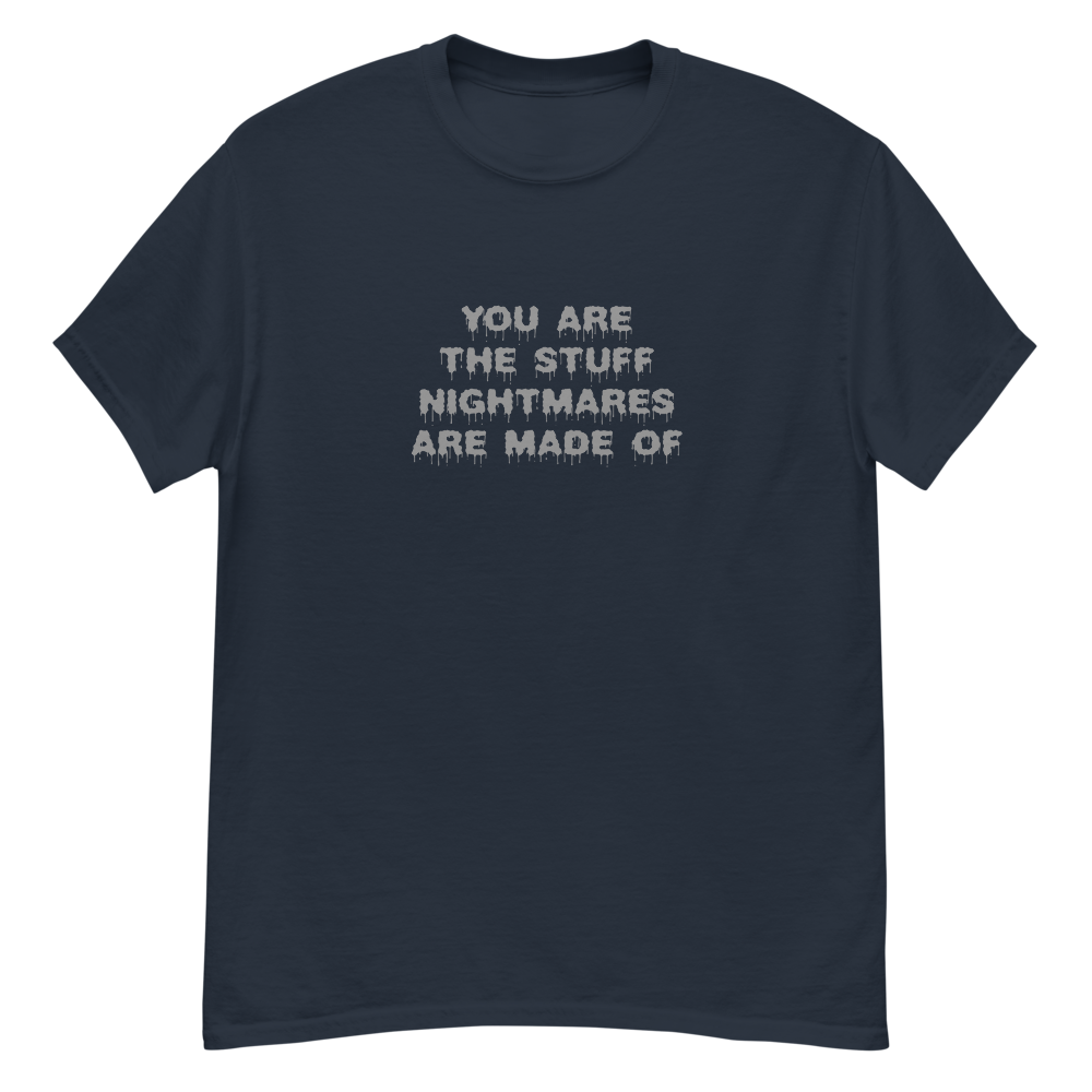 "You are the stuff nightmares are made of" printed on a navy unisex classic tee laying on a flat surface