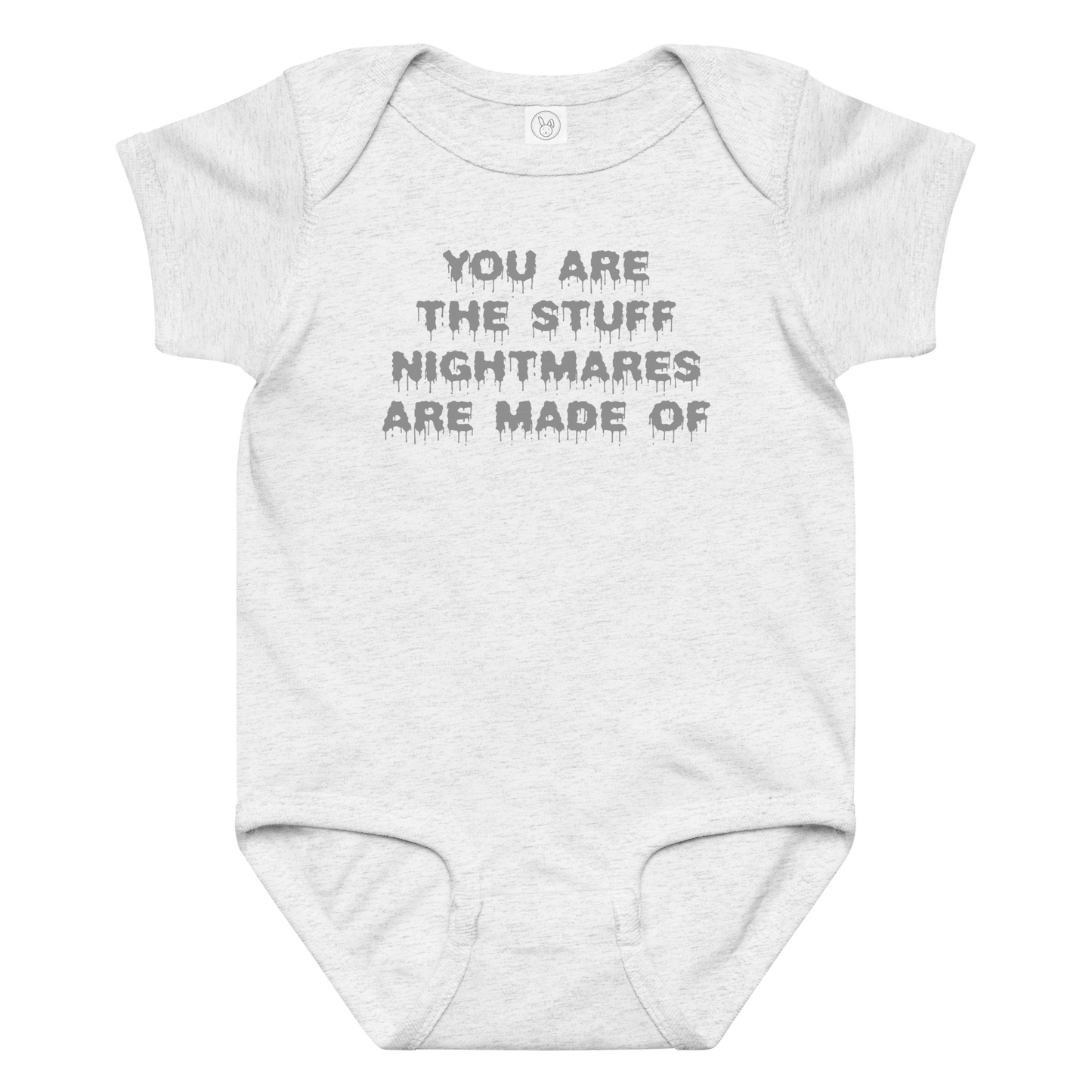 "You are the stuff nightmares are made of" printed on a ash baby jersey bodysuit laying on a flat surface amongst other clothes