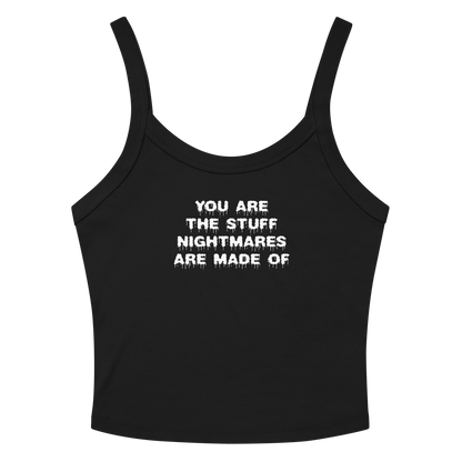 "You are the stuff nightmares are made of" printed on a solid black blend women's micro-rib tanktop laying on a flat surface amongst sunglasses and shorts