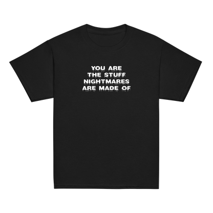 "You are the stuff nightmares are made of" printed on a black youth classic tee laying on a flat surface